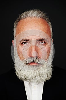 Bearded senior man in formal wear