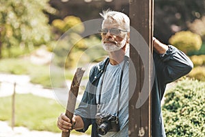 The bearded senior thinks about the future, dreams. Active lifestyle of a gray-haired man