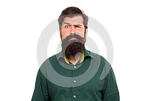 Bearded and unshaven. Bearded man raise eyebrow isolated on white. Brutal hipster with beard and mustache. Barbershop