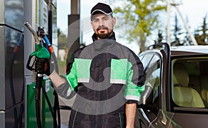 Bearded worker of gas station
