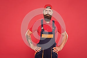 Bearded worker. Hard worker red background. Construction worker or miner ready to work. brutal hipster search craftsman