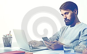 Bearded working businessman isolated