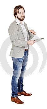 bearded young business man using digital tablet. portrait isolated over white studio background.