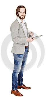 bearded young business man using digital tablet. portrait isolated over white studio background.