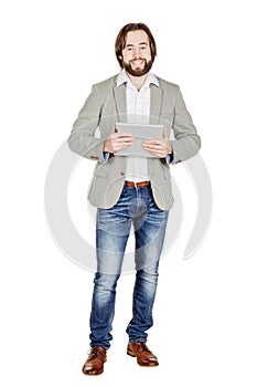 bearded young business man using digital tablet. portrait isolated over white studio background.