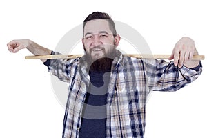 Bearded young farmer in plaid shirt