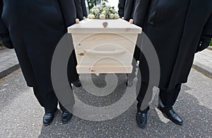 Bearers with coffin