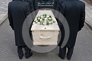 Bearers with coffin