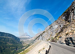 BEARHAT MOUNTAIN AT THE TOP OF LOGAN PASS ON THE GOING TO THE SUN HIGHWAY UNDER CIRRUS CLOUDS IN GLACIER NATIONAL PARK USA