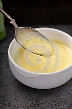 Bearnaise sauce in a small bowl