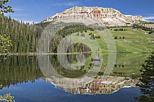 Beartooth Butte and Bear Lake with fishing boat photo