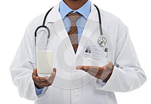 Beat osteoporosis with a glass a day. Cropped view of a doctor endorsing a glass of fresh milk. photo