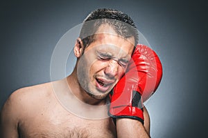 Beaten boxer crying