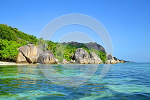 Beatiful beach Anse Source d`Argent with big granite stones in La Digue Island, Indian Ocean, Seychelles.