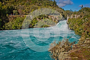 Beatiful blue water beneath of Huka Falls in Taupo in New Zealand