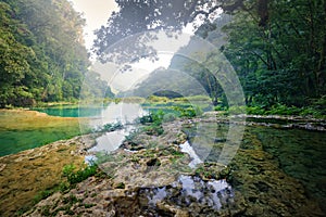 Beatiful Cascades National Park in Guatemala Semuc Champey at sunset. photo