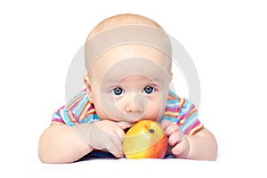 Beatiful little boy with apple