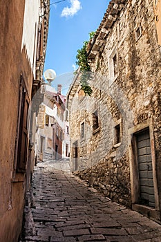 Beatiful narrow street in Mediterranean Europe, Croatia photo