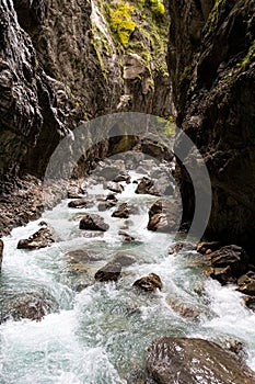 Beatiful river Partnach with wet rocks in Partnachklamm