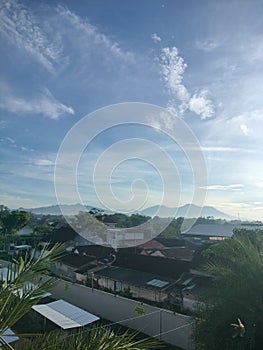 Beatiful sky with two mountain photo