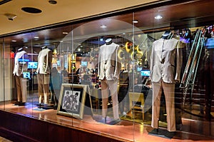 The Beatles Band Official Costumes Displayed in the Storefront of Hard Rock Cafe in Times Square, Manhattan, New York City