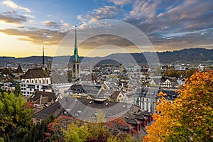 Beauitful sunset over Zurich in autumn with FraumÃ¼nster church