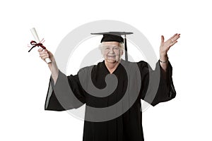 Beauitiful Caucasian woman in a black graduation gown with diploma