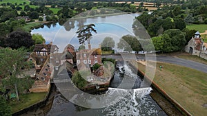 Beaulieu Mill Cottage with bridge and lake on Beaulieu River