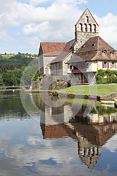 Beaulieu sur Dordogne and the chapel of Penitents along the Dordogne river photo
