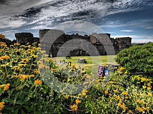 Beaumaris on the island of Anglesey is famous as the greatest castle never built. It was the last of the royal strongholds created