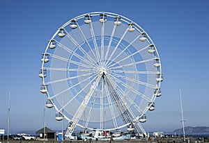 Beaumaris, Wales - the Ferris wheel and blue sky.