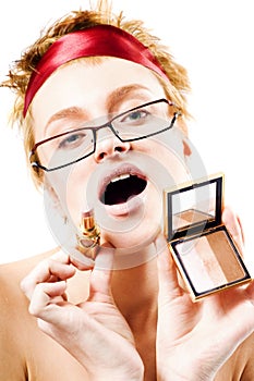 Beaury woman with lipstick and mirror