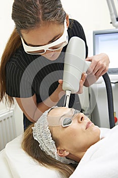 Beautician Carrying Out Fractional Laser Treatment