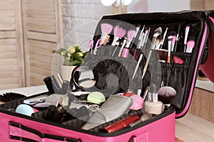 Beautician case with professional makeup products and tools