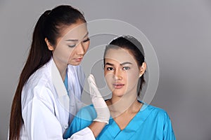 Beautician Doctor Check Diagnose Face structure patient before p