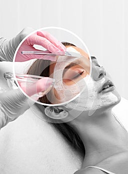 Beautician makes a face mask to rejuvenate the skin. Cosmetology treatment of problem skin on the face and body