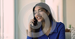 Beautiful 20s Indian girl enjoying telephone communication