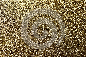 Beautiful abstract art texture background of gold color glitter