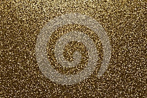 Beautiful abstract art texture background of gold color glitter