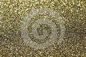 Beautiful abstract art texture background of gold color glitter