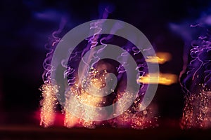 A beautiful, abstract artistic image of New Year Eve fireworks. Colorful picture with blur and lights.