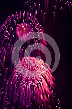 A beautiful, abstract artistic image of New Year Eve fireworks. Colorful picture with blur and lights.