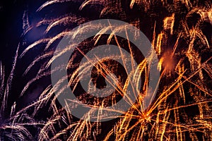 A beautiful, abstract artistic image of New Year Eve fireworks. Colorful picture with blur and lights.