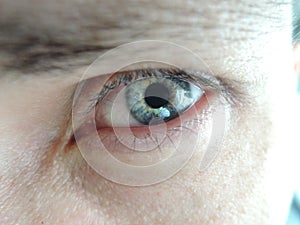 Beautiful abstract blue eye, extreme closeup