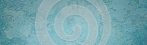 Beautiful abstract grunge decorative light blue cyan painted stucco wall texture. Handmade rough paper white background