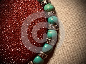 Beautiful abstract view of silver turquoise jewellery, bracelet colour, round cozy Holiday gift, relaxing atmosphere
