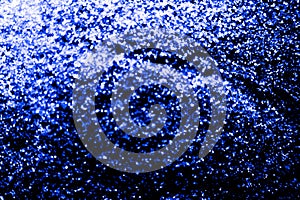 Beautiful abstract white and blue glitter texture on the white background and light glitter sparkle confetti gray purple grainy