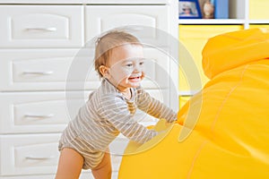 Beautiful adorable laughing baby boy infant face