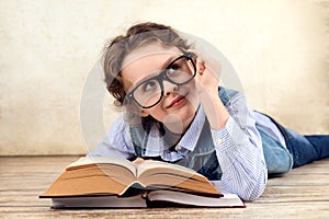 Beautiful adorable school girl with glasses