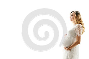 Beautiful adult pregnant woman. Waiting for the baby. Pregnancy. Care, tenderness, motherhood, childbirth. White